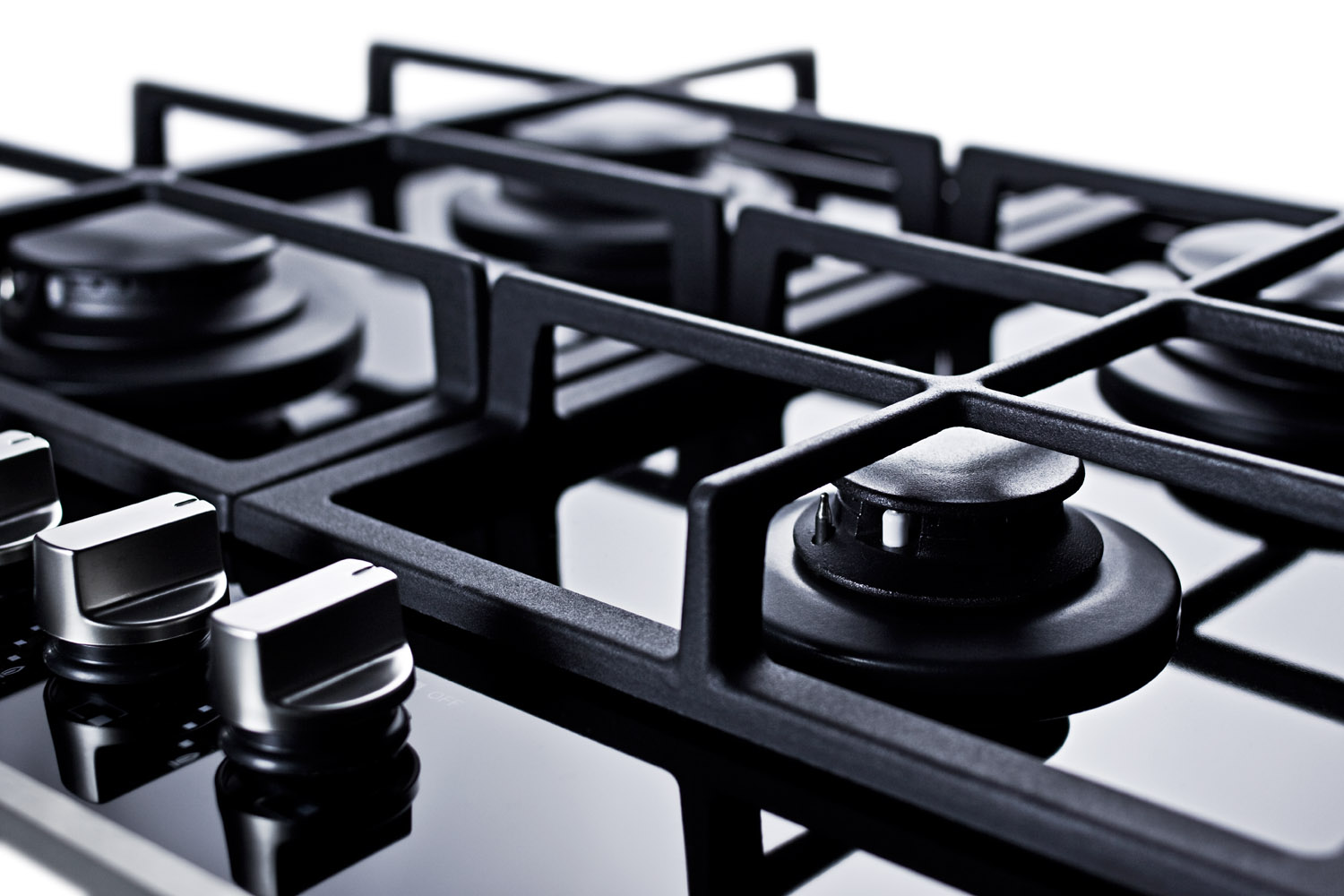 4-burner gas-on-glass cooktop with sealed burners and cast iron grates